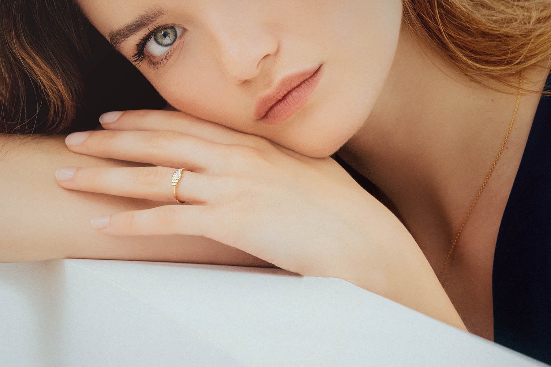 Destinée collection engagement ring in 18K yellow gold diamond pavé