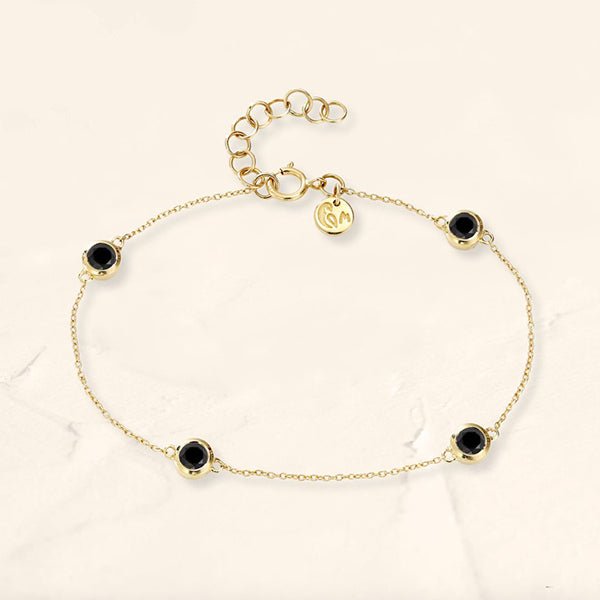 Black diamond bracelet with bezel-set yellow gold 4x4mm