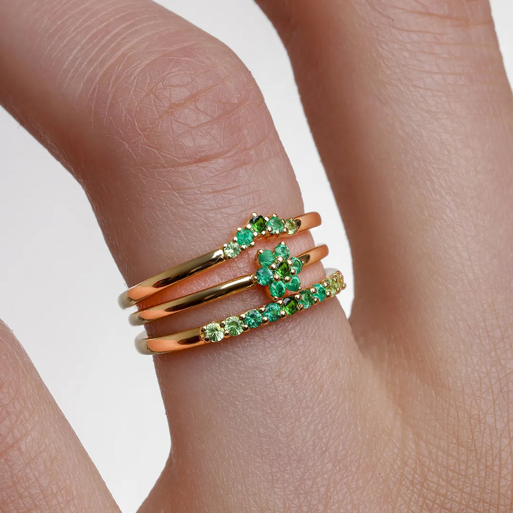 Mayuri Canopée collection Emerald rings — Surya, Anaya and Kiran stacking rings in 18K Yellow Gold with a tsavorite and Emerald gradient
