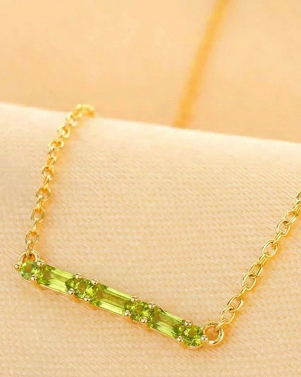Peridot jewellery set in 18K yellow gold by Mayuri, bespoke creation for the August birthstone
