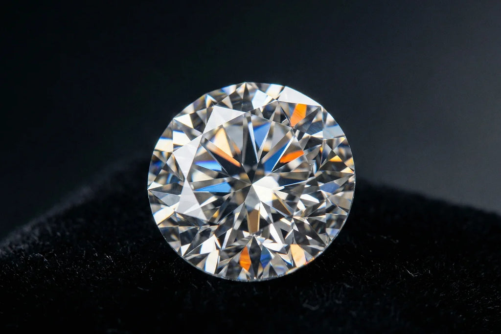 Close-up of a brilliant cut natural diamond, light playing across its facets