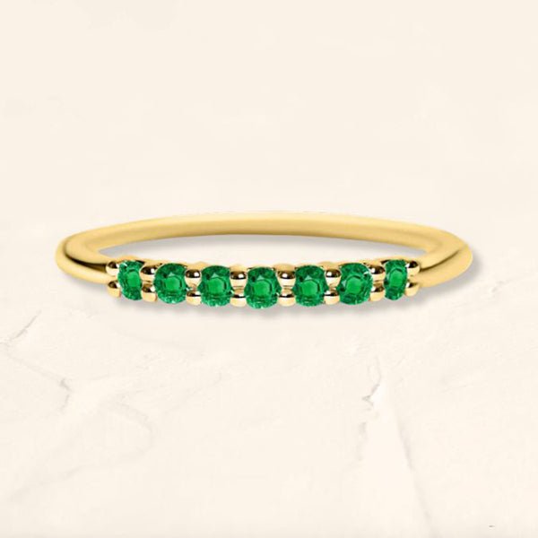 Bague vadha en or jaune sertie de 7 émeraudes