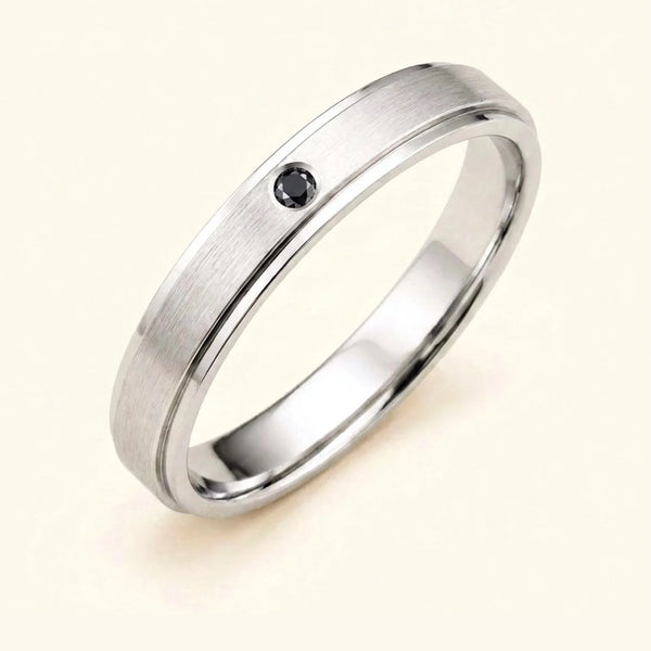 Dhruva black diamond wedding band in 18k white gold for men, brushed band bezel setting