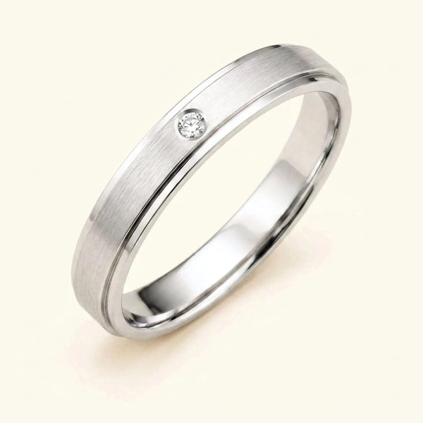 Dhruva diamond wedding band in 18k white gold for men, brushed band bezel setting