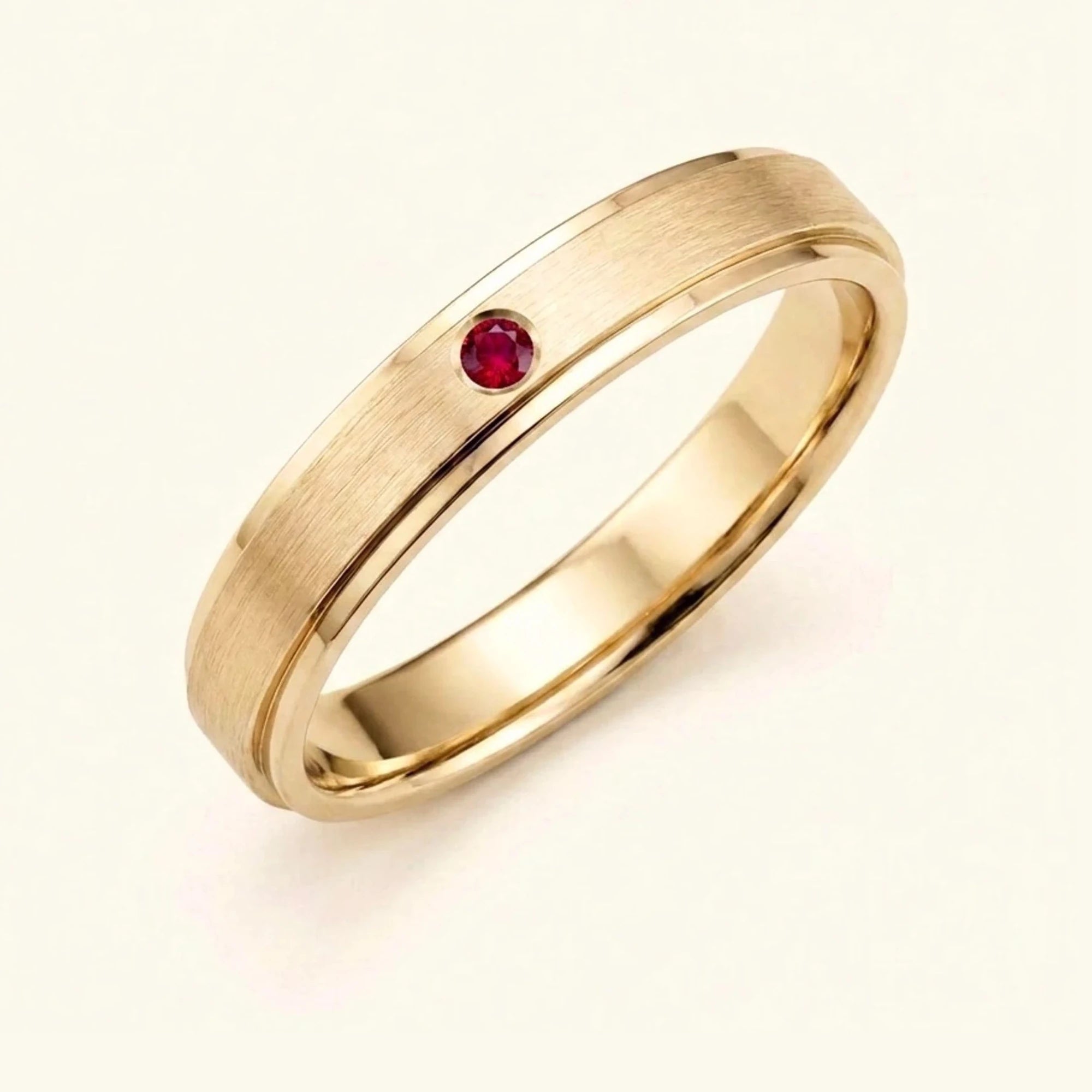 Dhruva ruby wedding band in 18k yellow gold, brushed band bezel setting