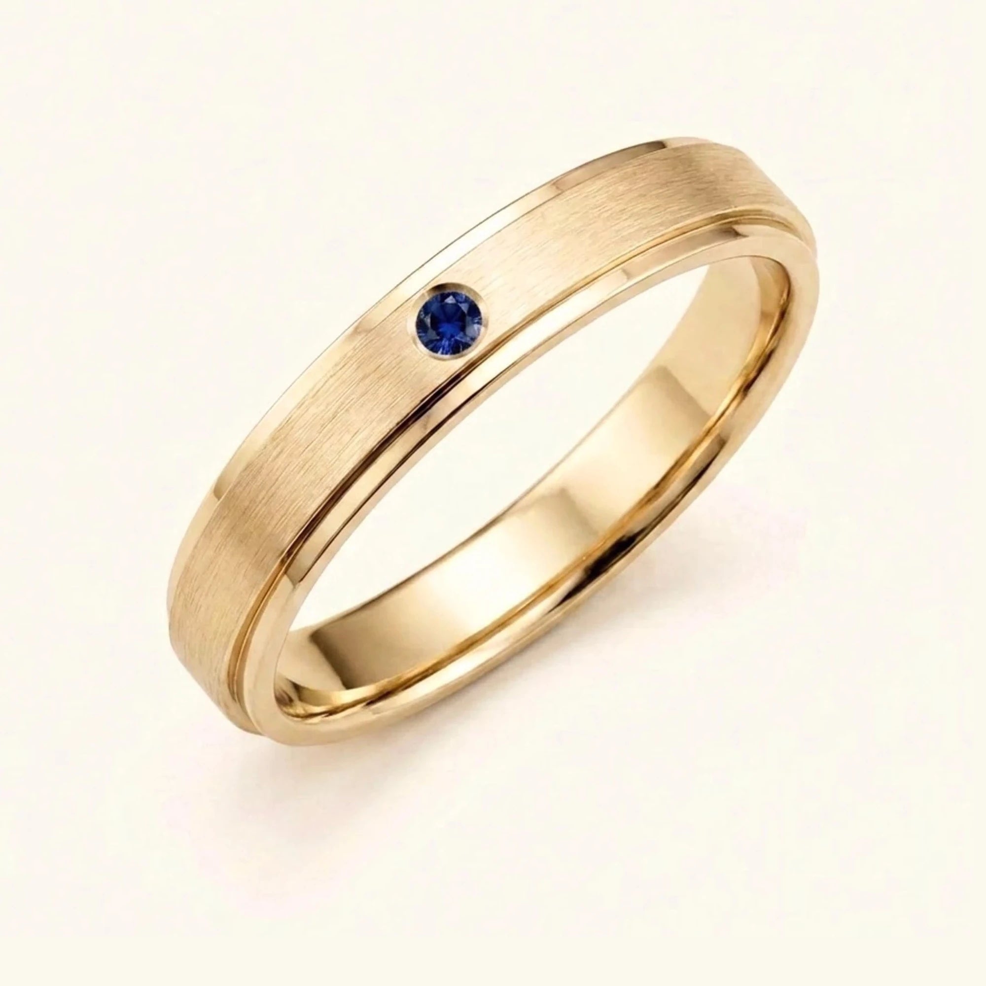 Dhruva sapphire wedding band in 18k yellow gold, brushed band bezel setting