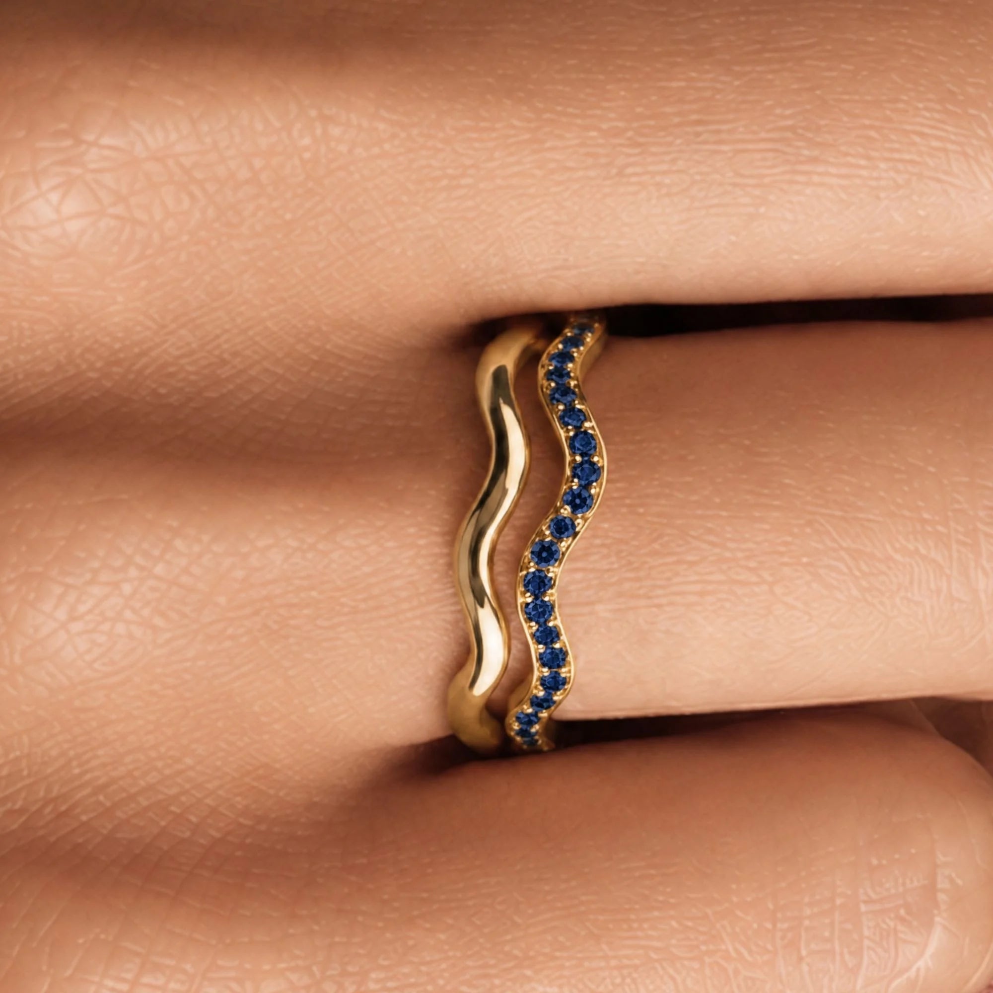Thalassa wave wedding ring with sapphires worn as a duo, 18K yellow gold