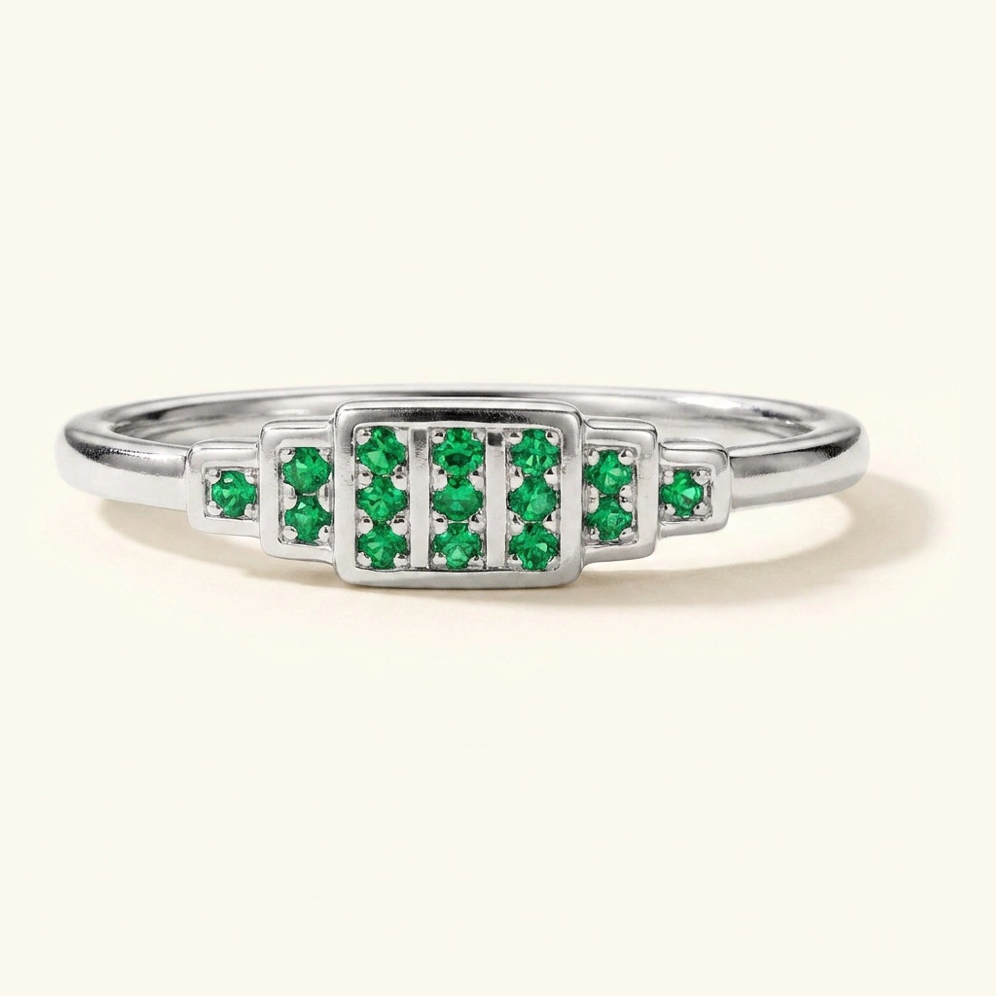 Brami XL geometric art deco wedding ring in white gold set with emeralds
