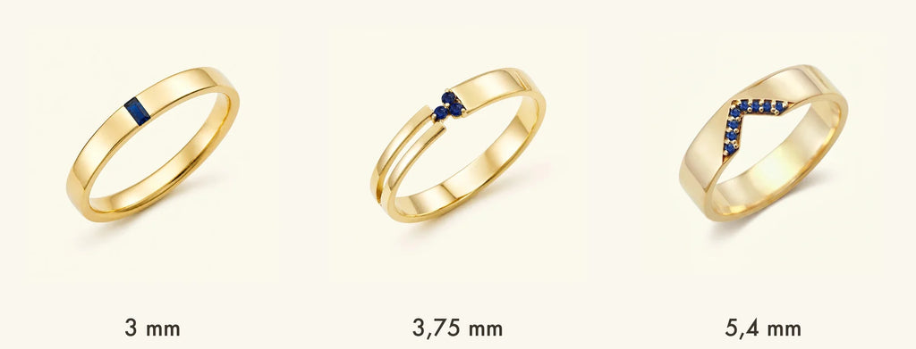 Three widths of Mayuri men's engagement rings in 18K yellow gold: Agni 3 mm, Vibhu 3.75 mm, and Rudra 5.4 mm