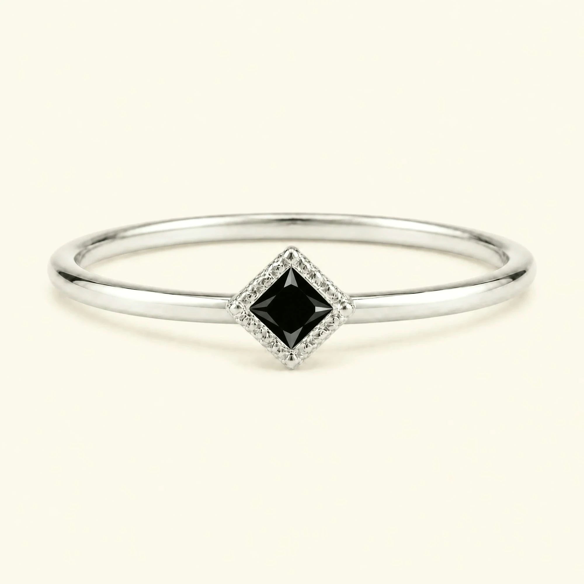 Indrani black diamond solitaire ring, 4mm princess twisted setting 18K white gold
