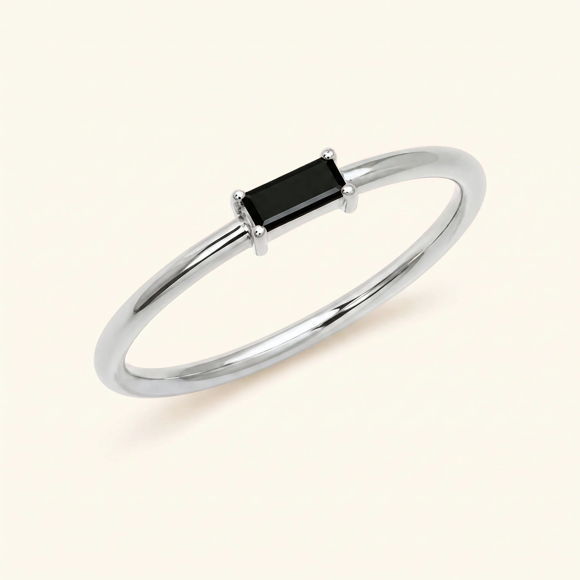 Black diamond solitaire ring baguette cut white gold