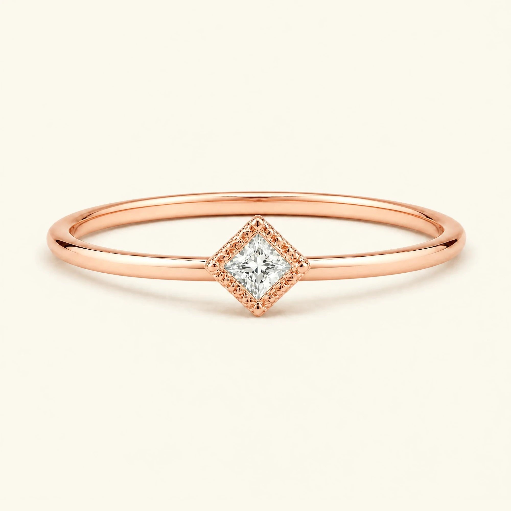 Vintage Indrani engagement ring — diamond solitaire princess cut 4 mm, square stone in twisted rope setting, 18K rose gold