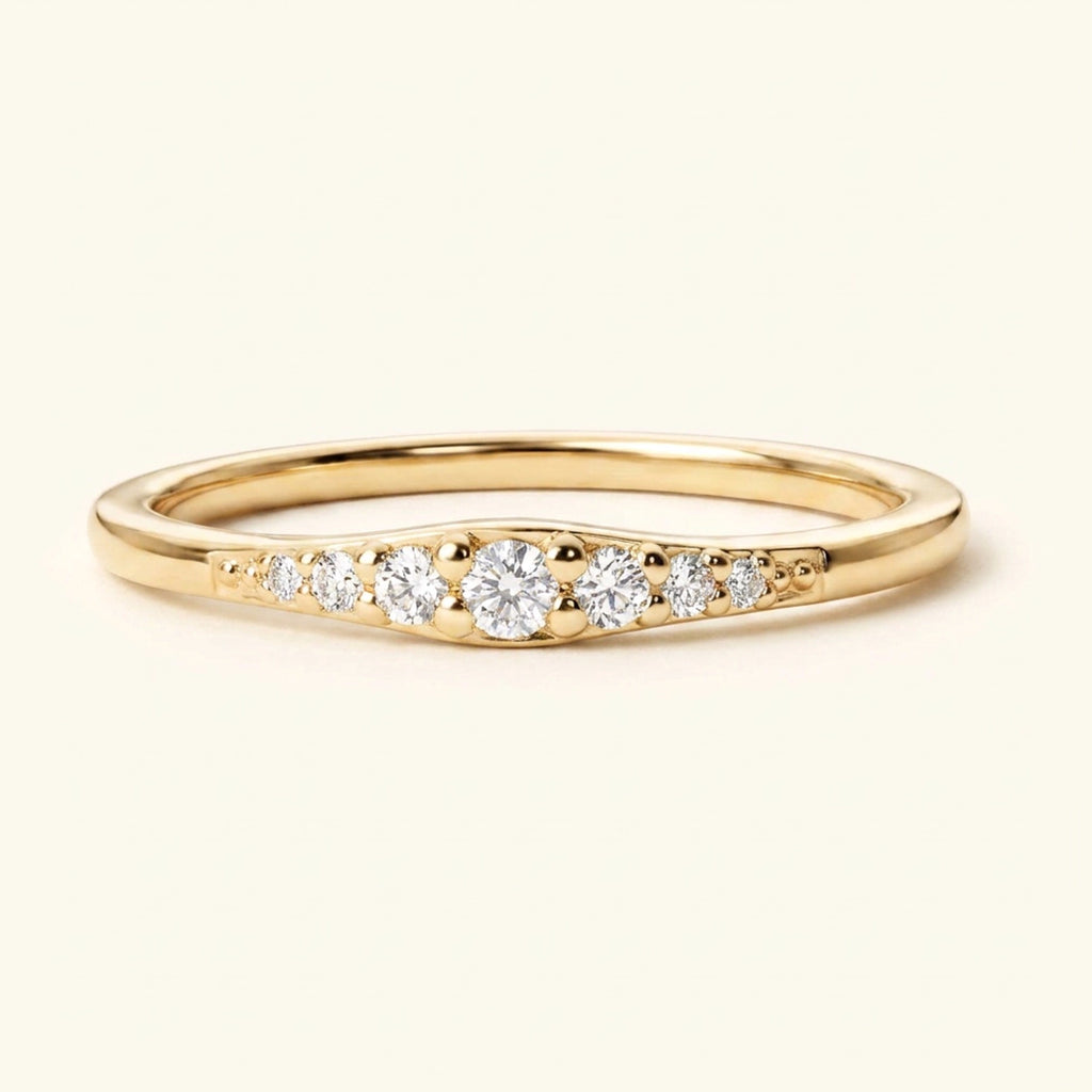 Sushma wedding ring in 18K Yellow Gold, graduated diamond setting by Mayuri