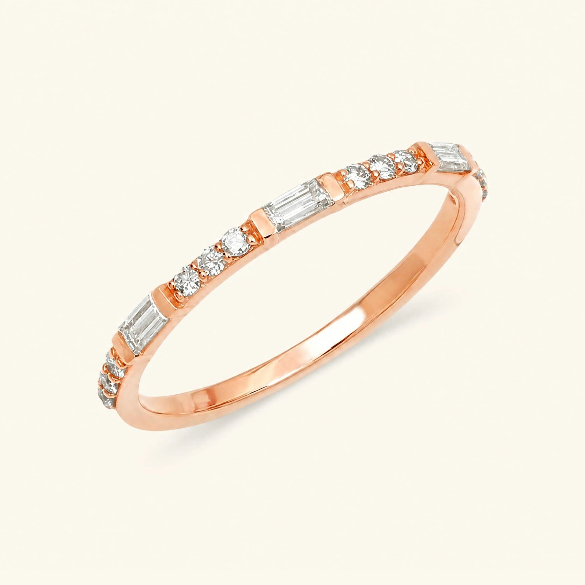 Bague semi eternitée baguette et diamant rond en or rose 18cts
