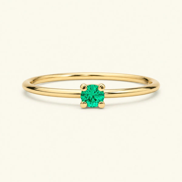 Bague Saral en or jaune sertie d'une émeraude