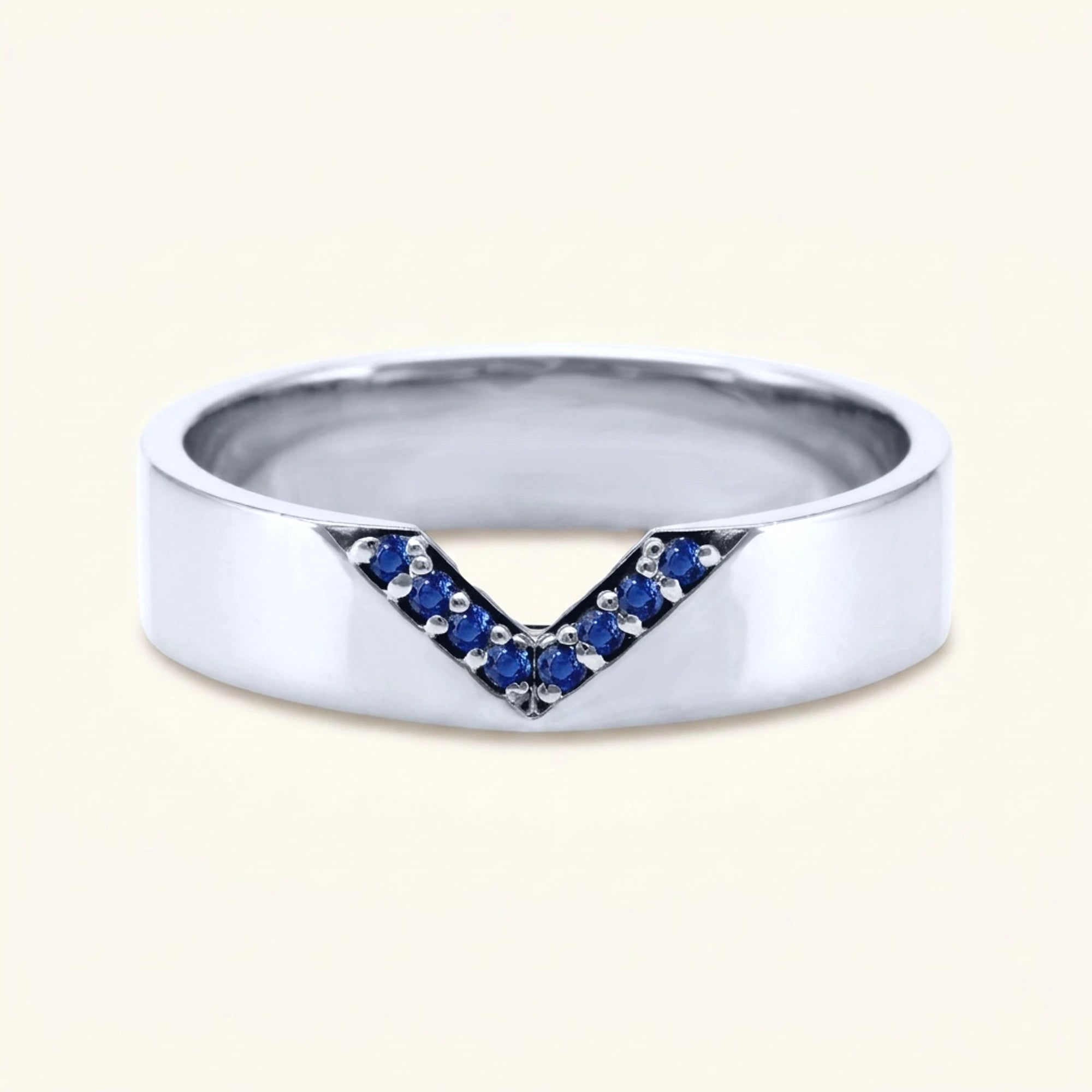 V-shaped ring pavé set with sapphires for men in white gold
