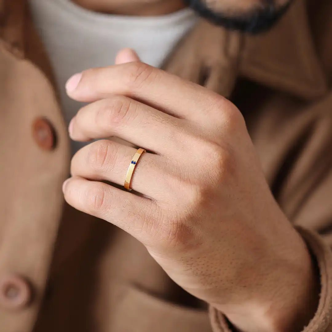 Sapphire wedding ring for men worn on finger