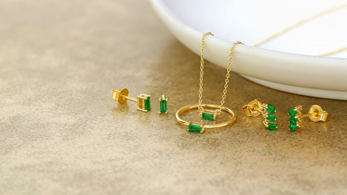 The Renaissance ring in vermeil set with baguette cut Emeralds by Mayuri