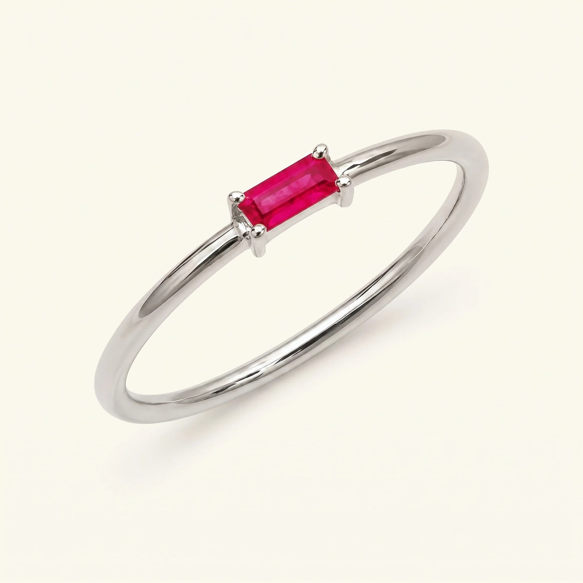Ruby solitaire ring white gold baguette