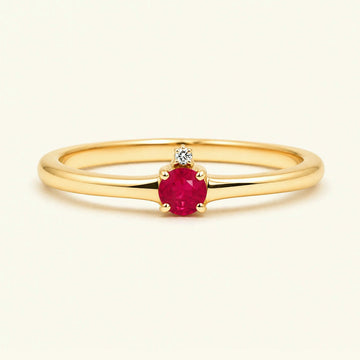 Ruby solitaire engagement ring in yellow gold