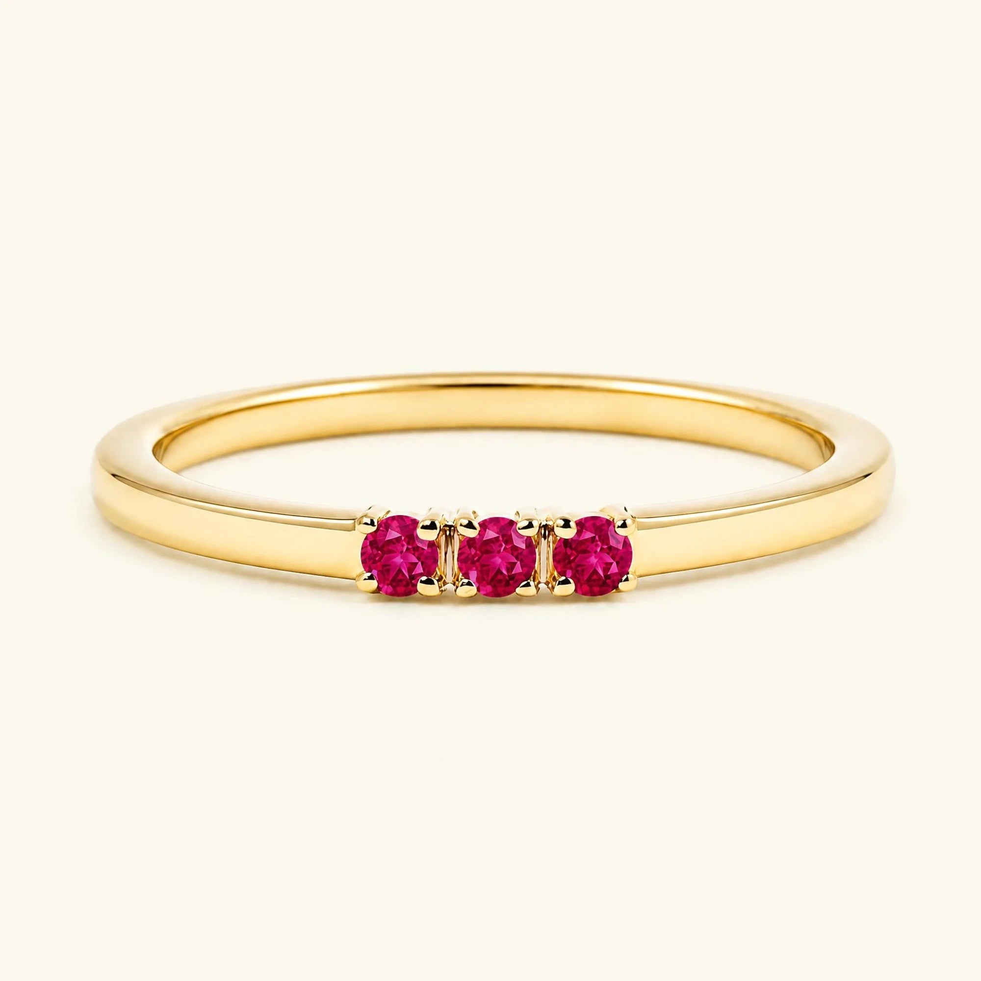 Bague de fiançailles trilogie de rubis en or jaune
