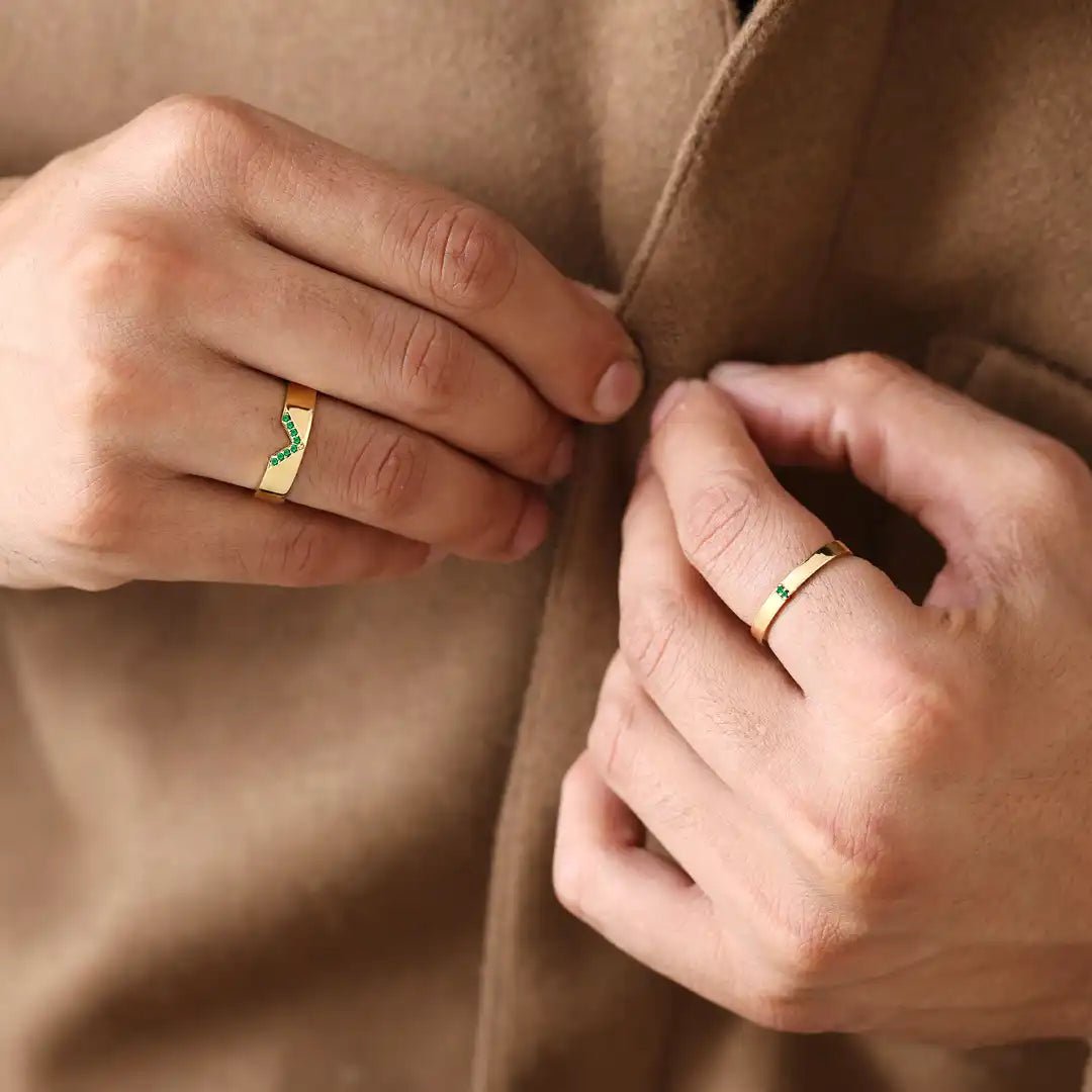 Rudra and Kabir emerald engagement rings in 18-karat gold