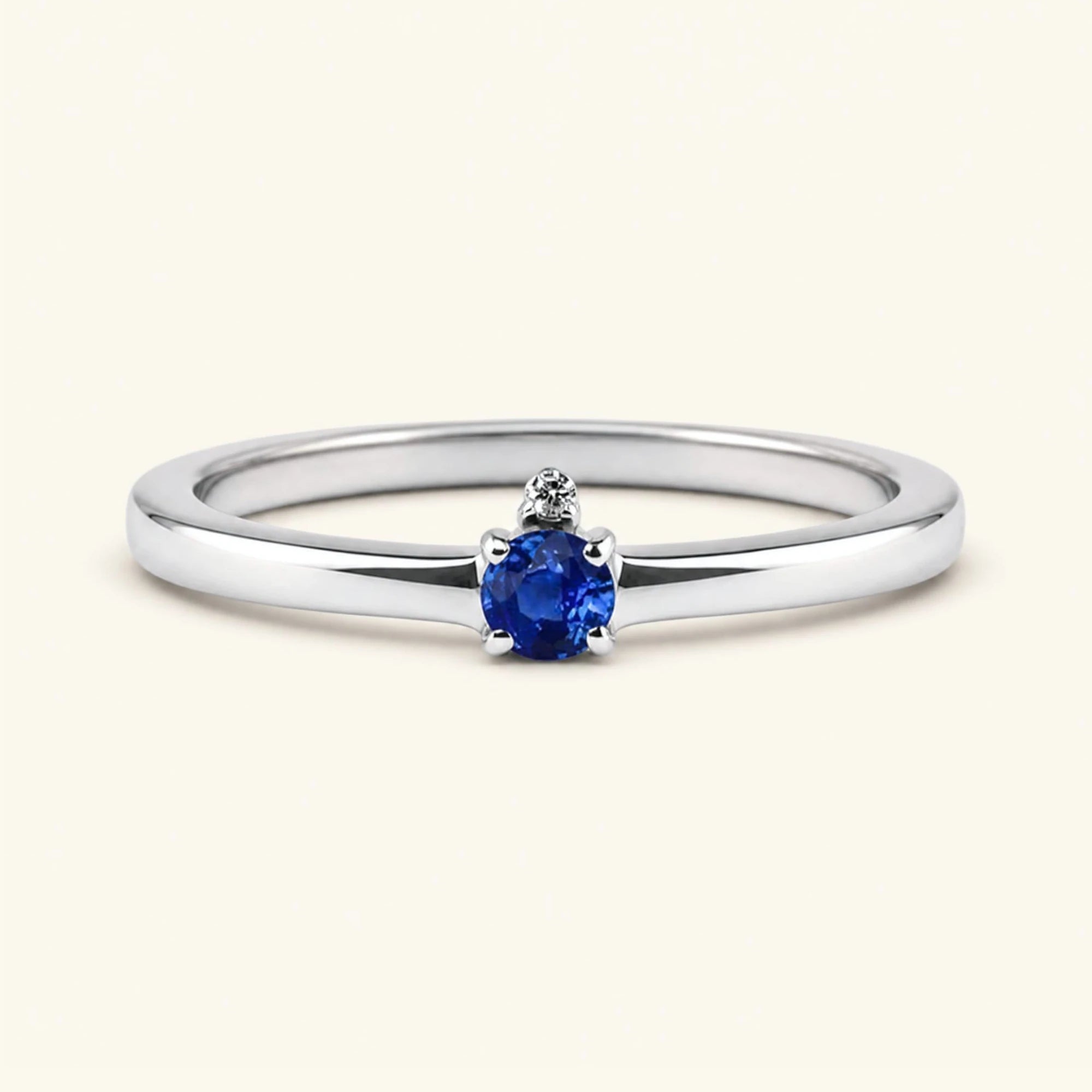 Sapphire solitaire engagement ring in white gold