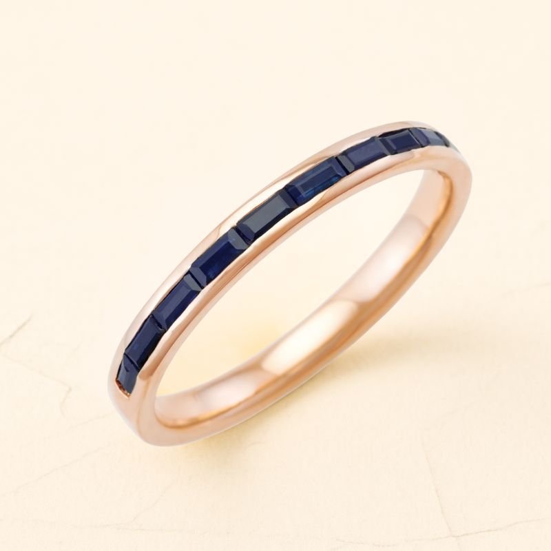 Mangal 18k rose gold ring with semi-eternity sapphire