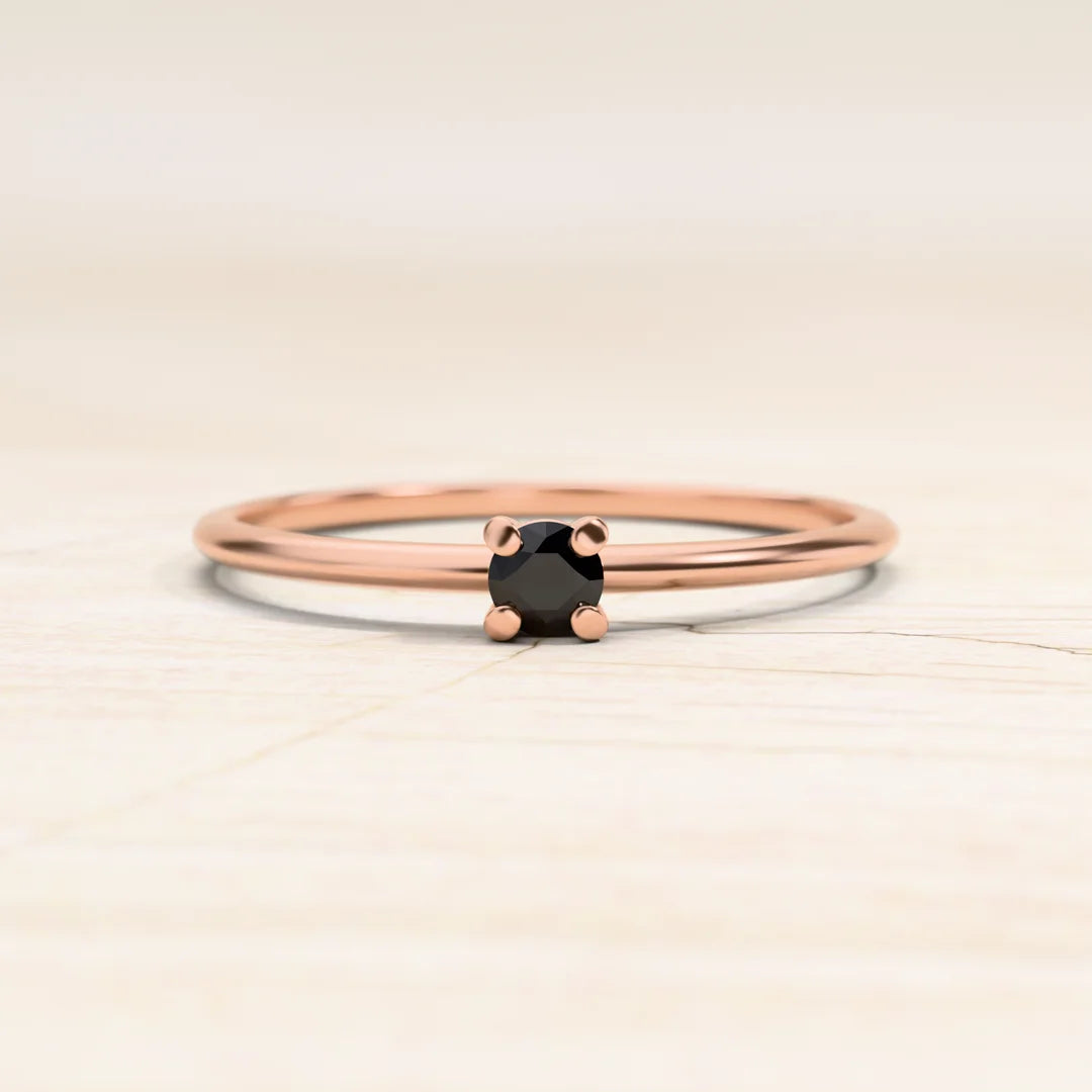 Bague solitaire diamant noir en or rose 18cts