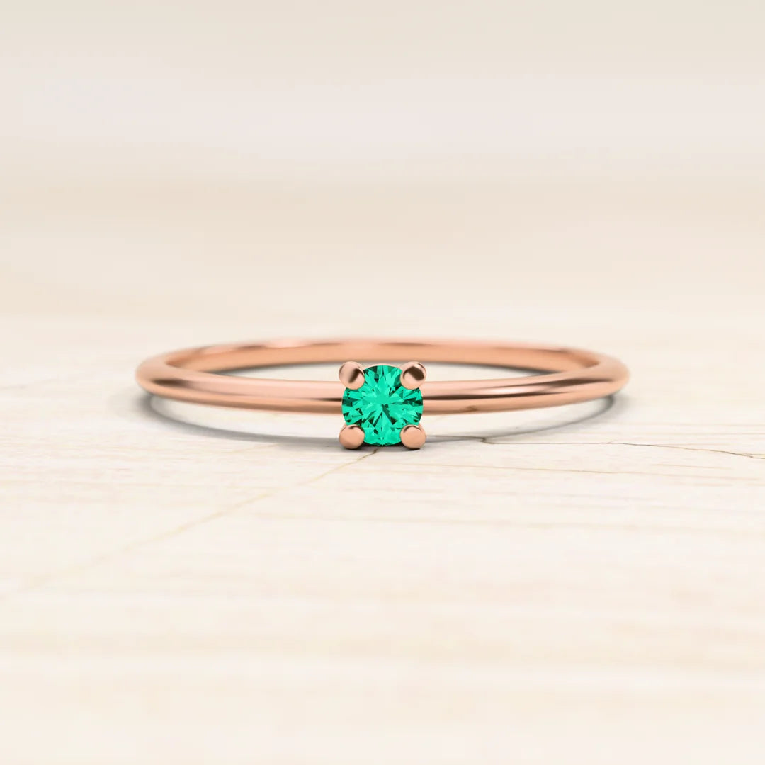 Saral ring in rose gold set with emerald