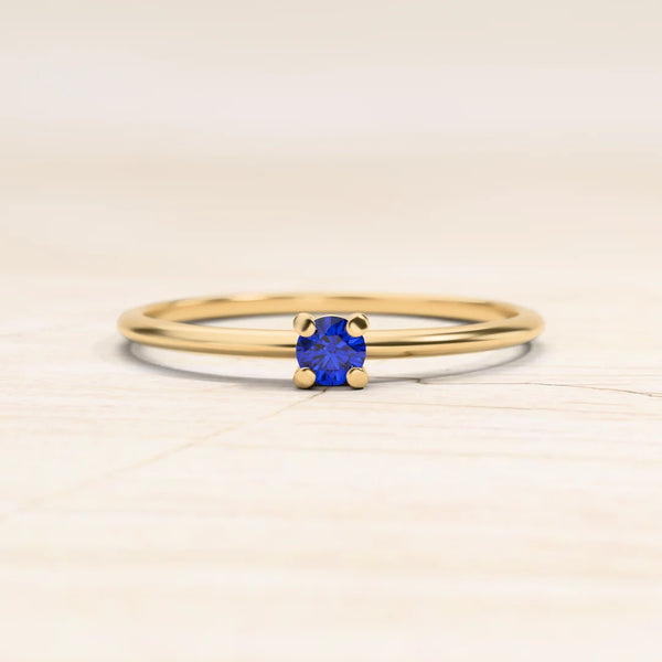Sapphire solitaire ring in yellow gold