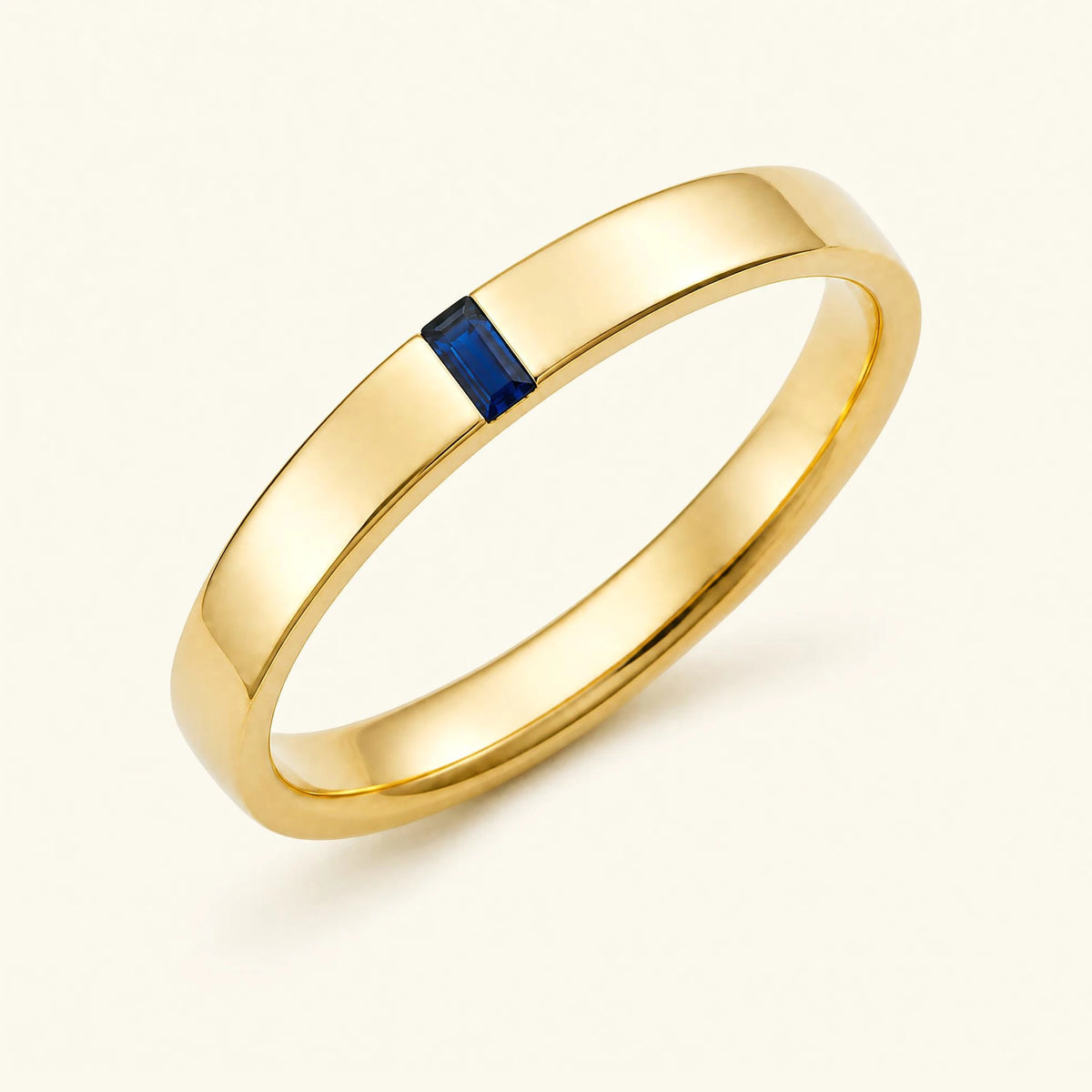 Baguette cut sapphire solitaire ring for men in yellow gold