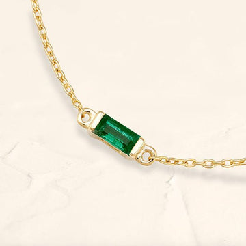 Shanti emerald baguette solitaire bracelet