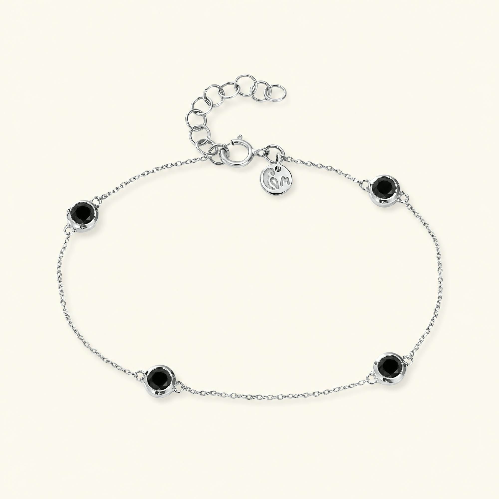 Black diamond bezel bracelet in white gold