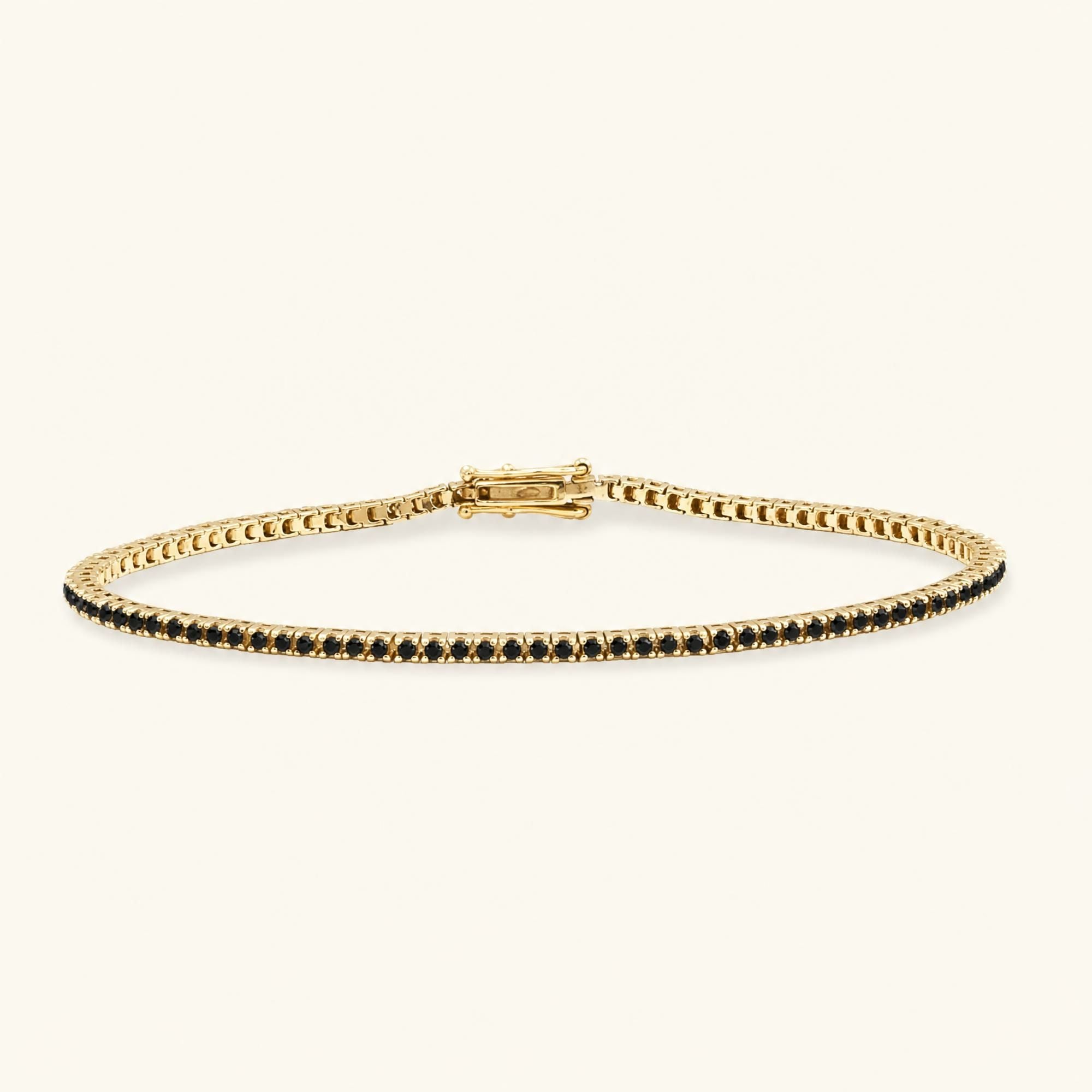 Bracelet tennis Ganga or jaune 18 carats serti de diamants noirs, joaillerie fine fermoir sécurisé