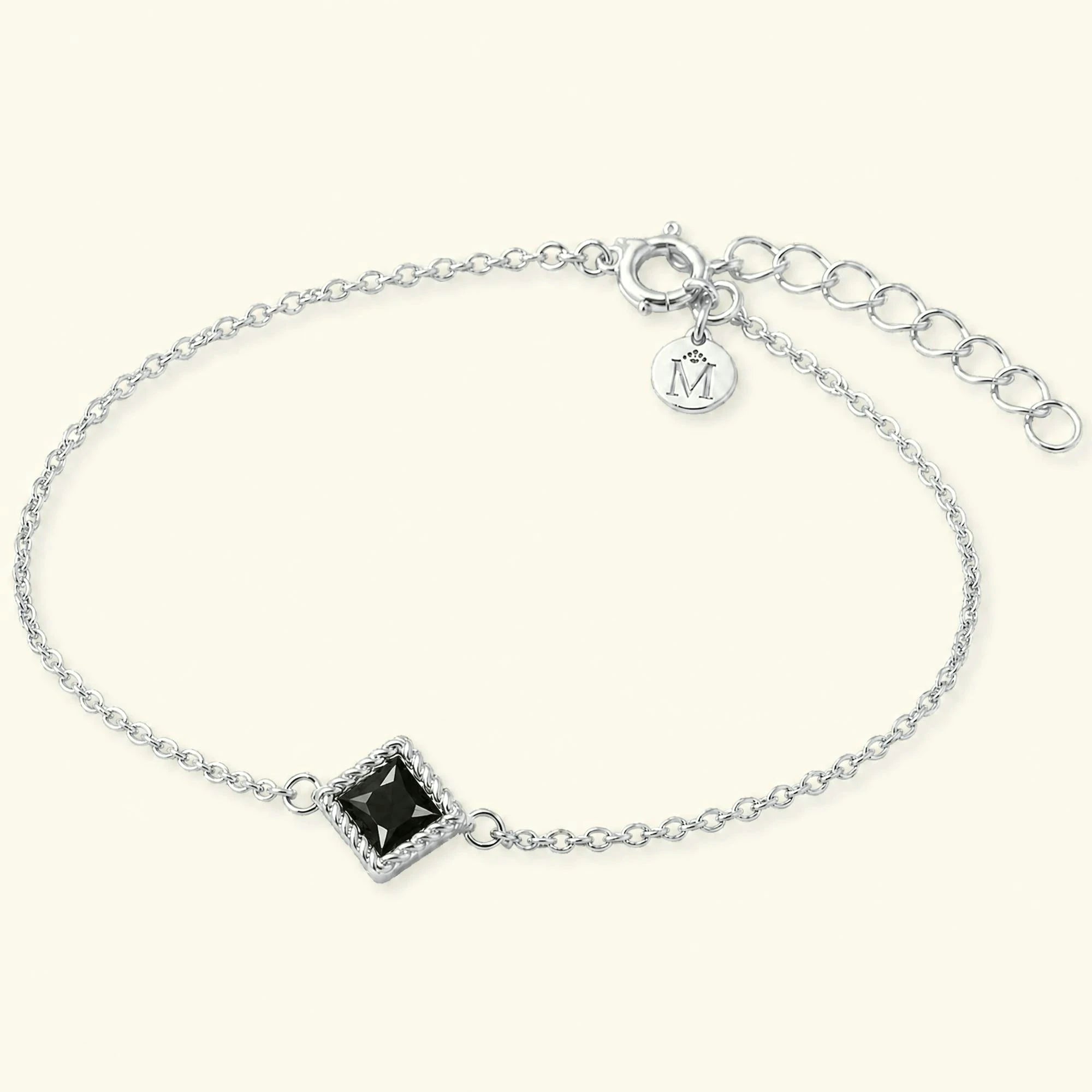Indrani black diamond solitaire bracelet fine chain, princess twisted setting 18K white gold