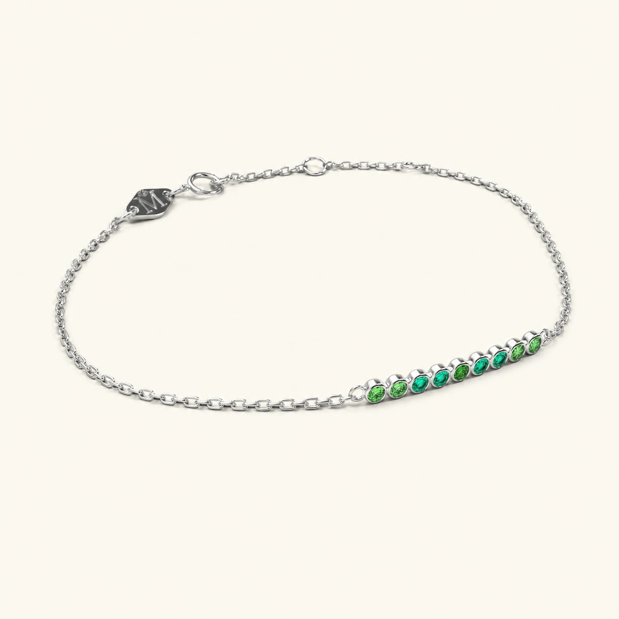 Noor white gold bracelet for women with emerald
