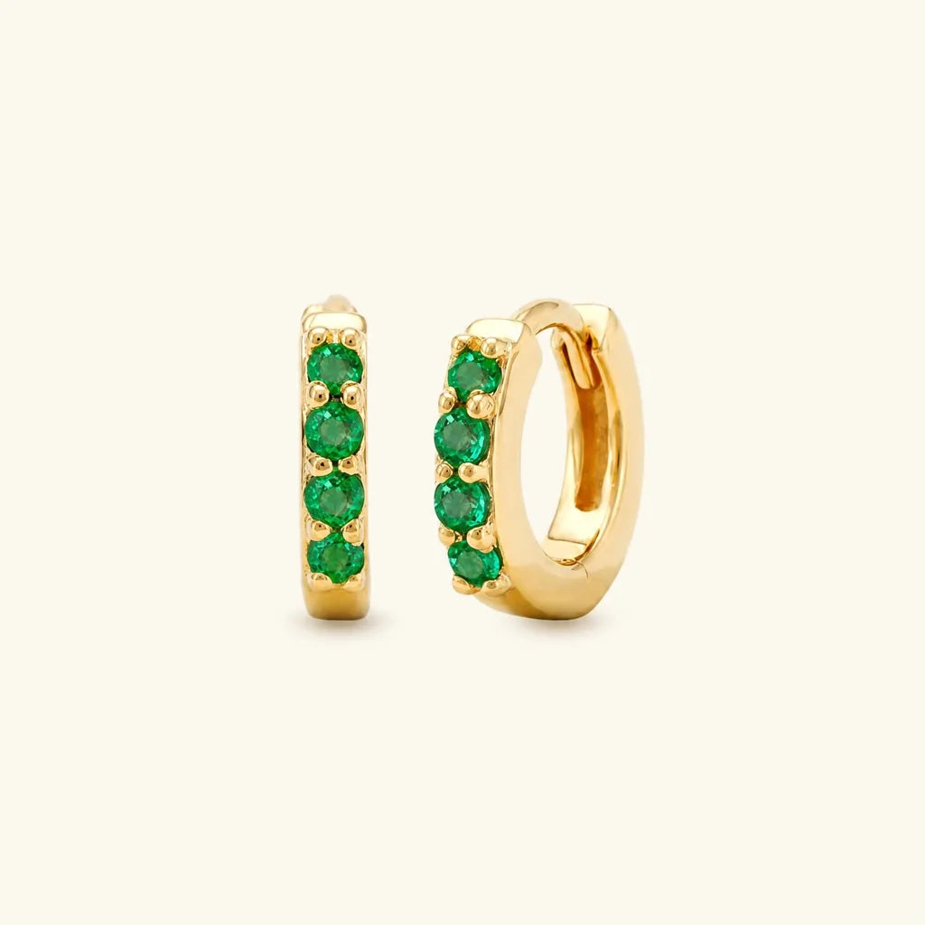 Sumitra huggie earrings in yellow gold set with four emeralds, a maid of honor gift