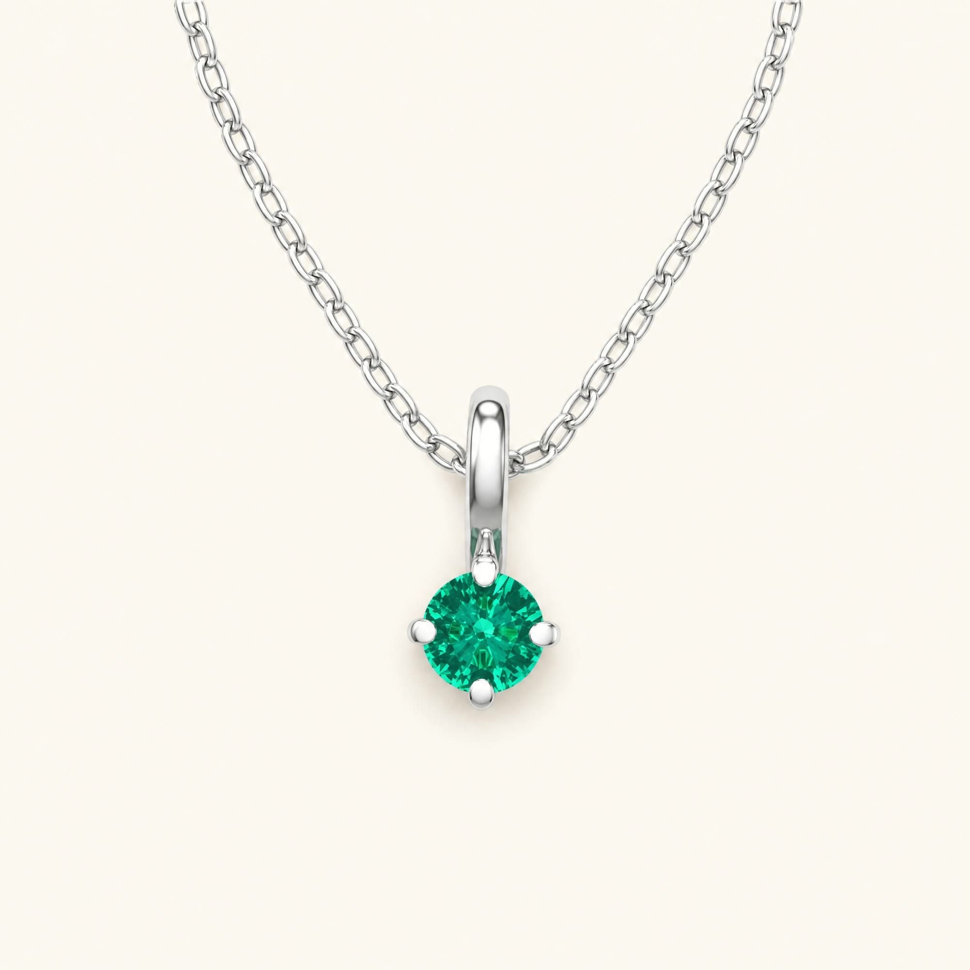 Saral white gold emerald solitaire necklace