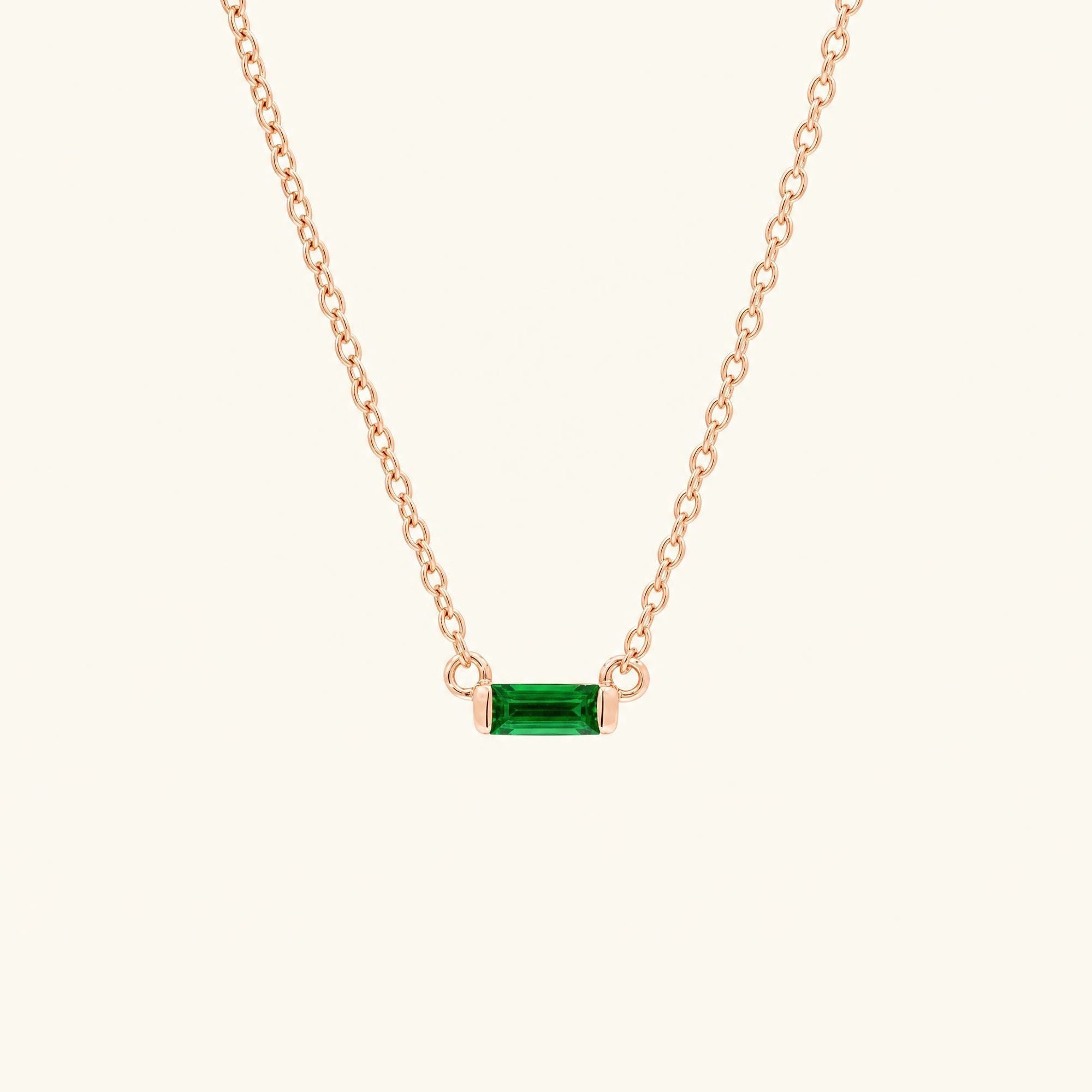 Shanti baguette cut emerald necklace in rose gold