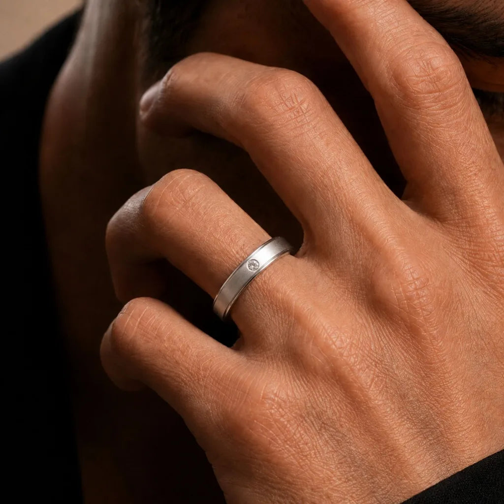18K White Gold bangle set with a Diamond, worn on the finger, by Mayuri