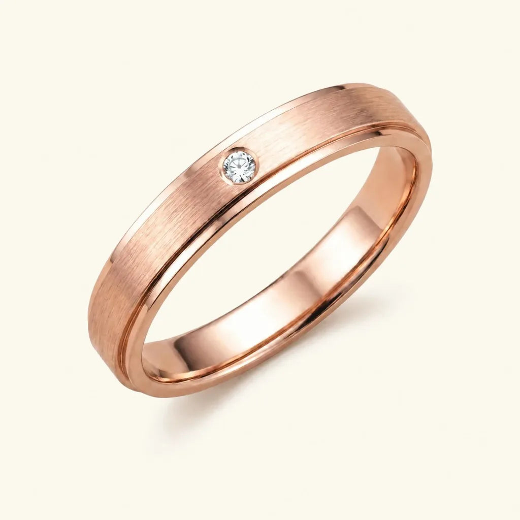 The Dhruva ring in 18K rose gold with a brushed-finish Diamond, by Mayuri