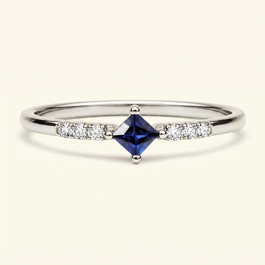 Kali ring with princess cut Sapphire and Diamond pave in white gold by Mayuri