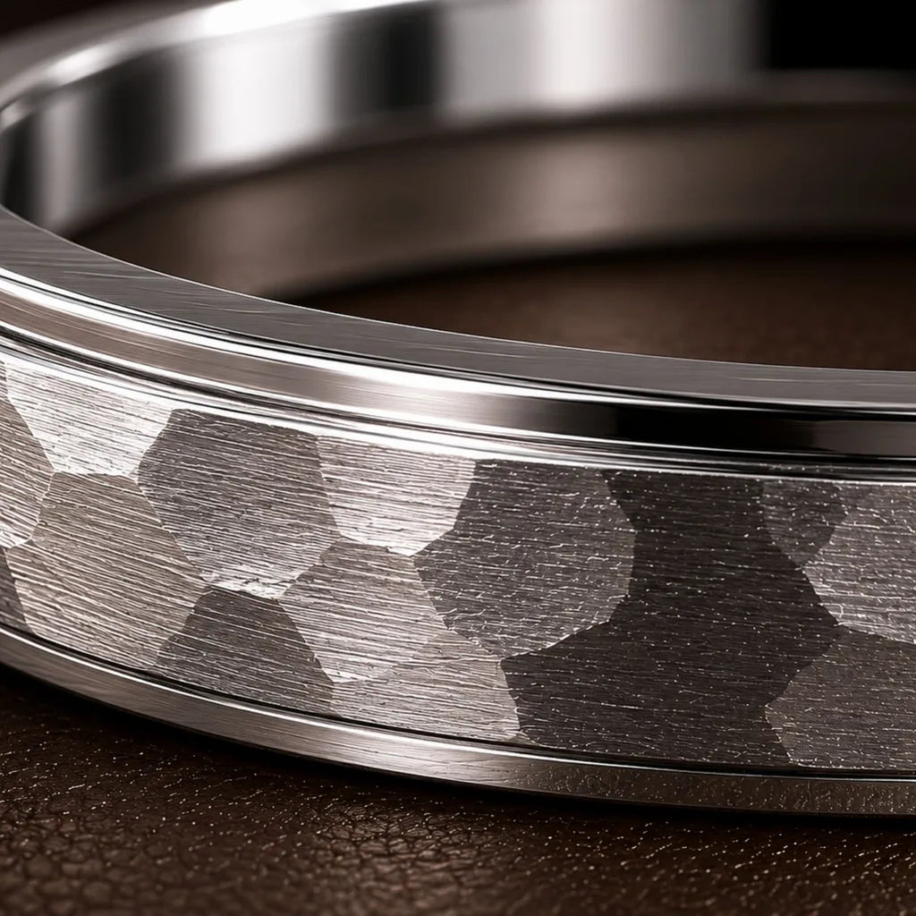 A hammered platinum wedding ring, detail of the crafted texture requiring appropriate care
