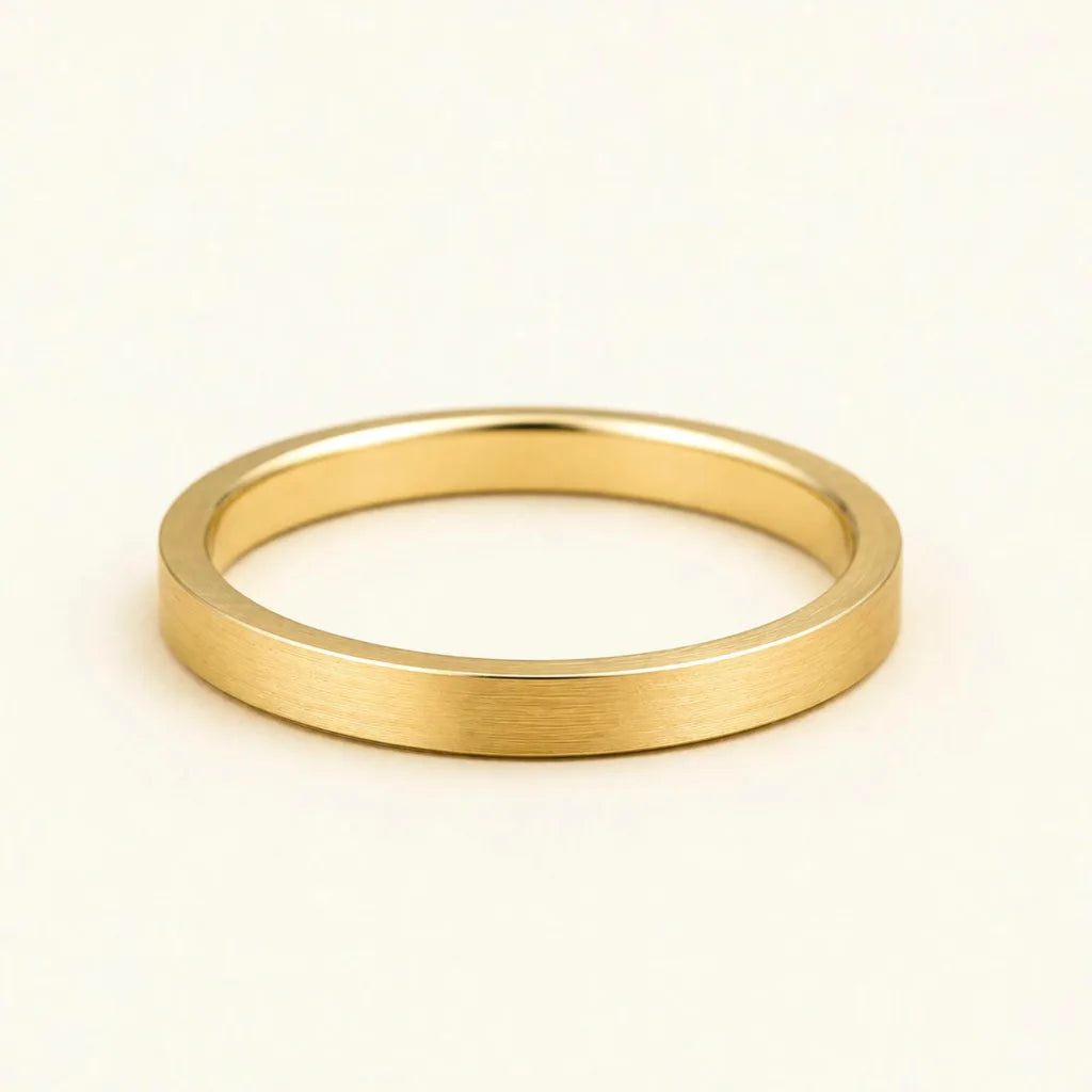 Kanso wedding ring in 18K yellow gold with a matte brushed finish, by Mayuri