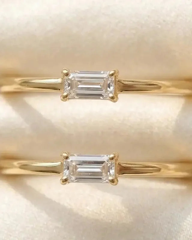 Fine solitaire ring in 18K yellow gold, emerald-cut diamond set in four prongs, natural vs synthetic diamond