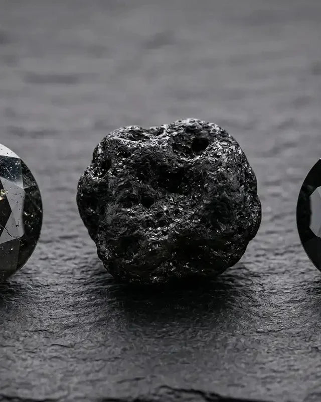 The three types of black diamonds: naturally included, carbonado, and treated, a gemological comparison