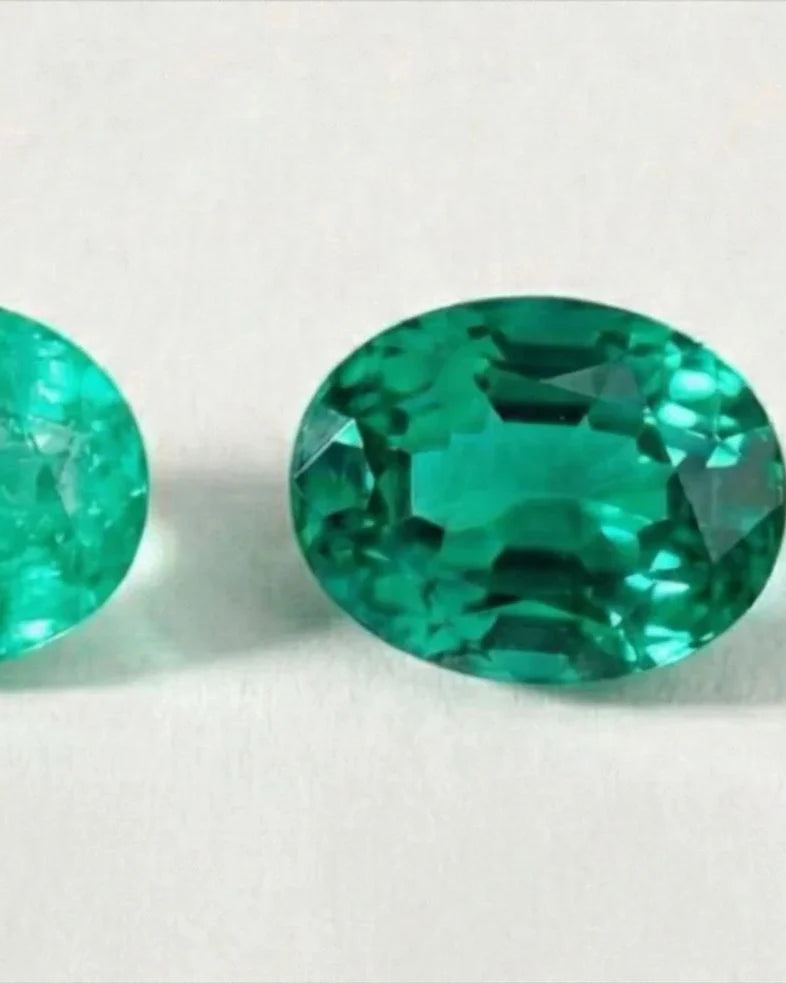 Unset oval-cut emeralds, green precious stones from Colombia and Zambia for fine jewellery