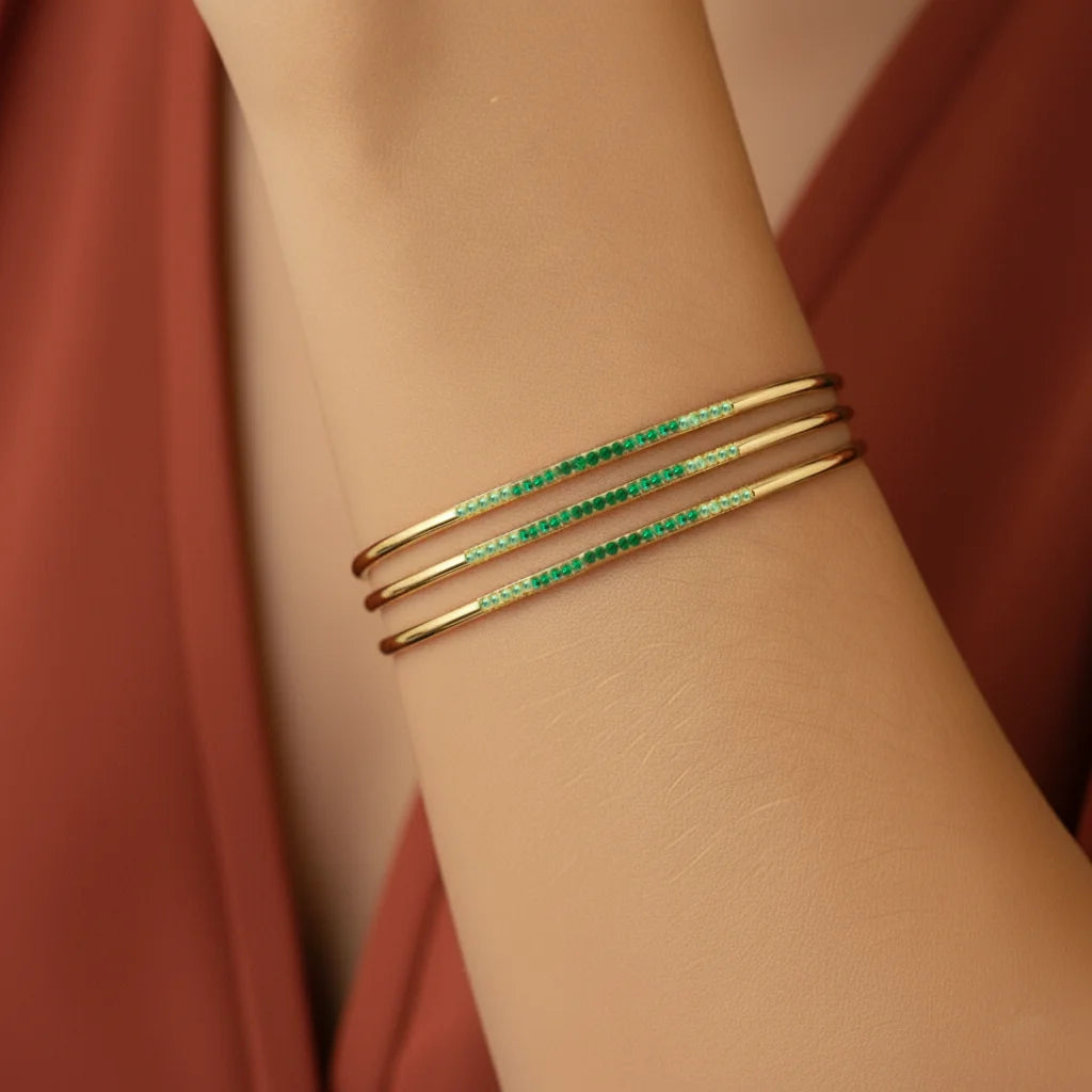 Mayuri Tarang tsavorite bangle from the Canopée collection in 18K gold