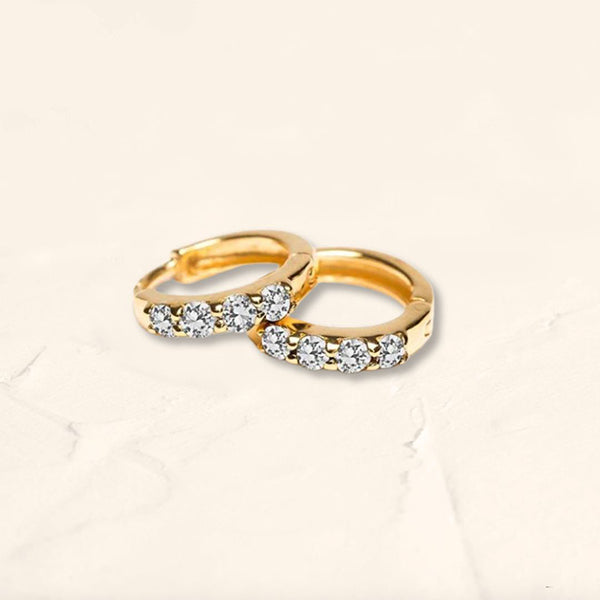 Mini diamond hoop earrings in 18-karat yellow gold